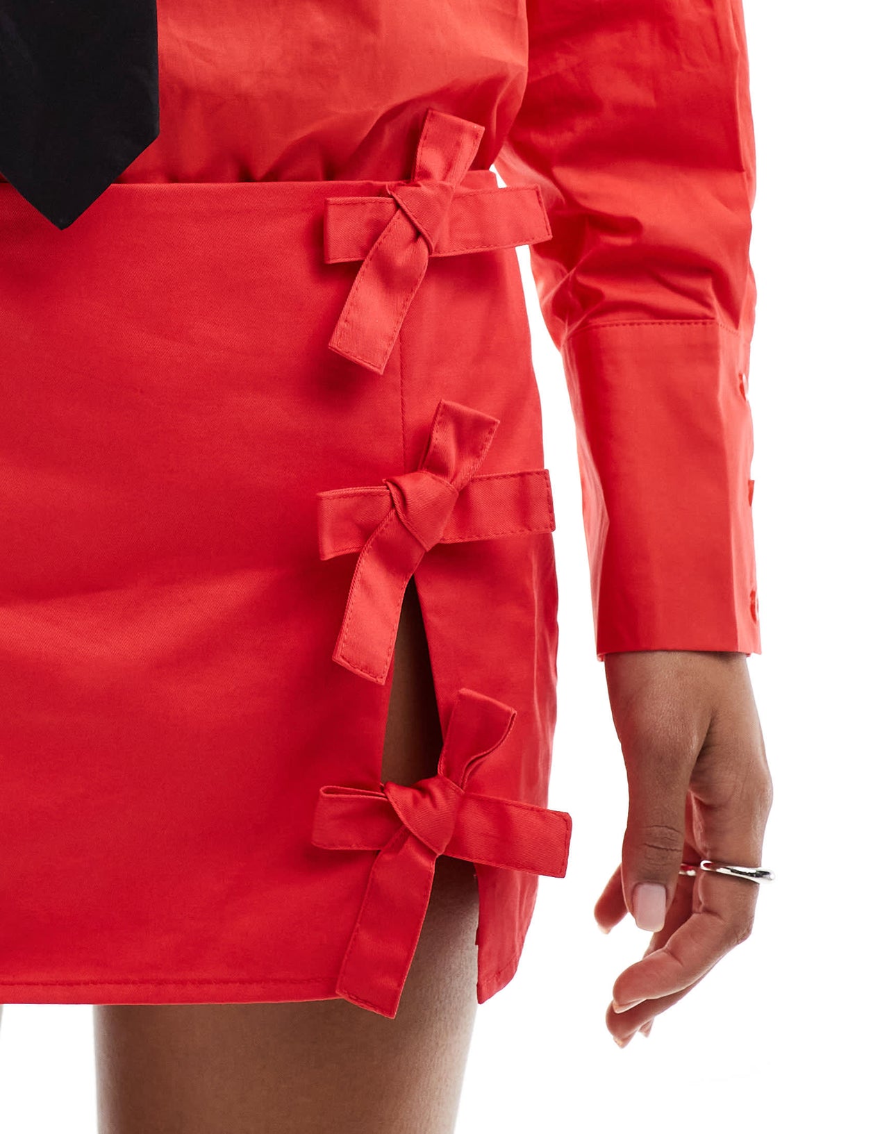 Lioness bow side cut out ultra mini skirt co-ord in red