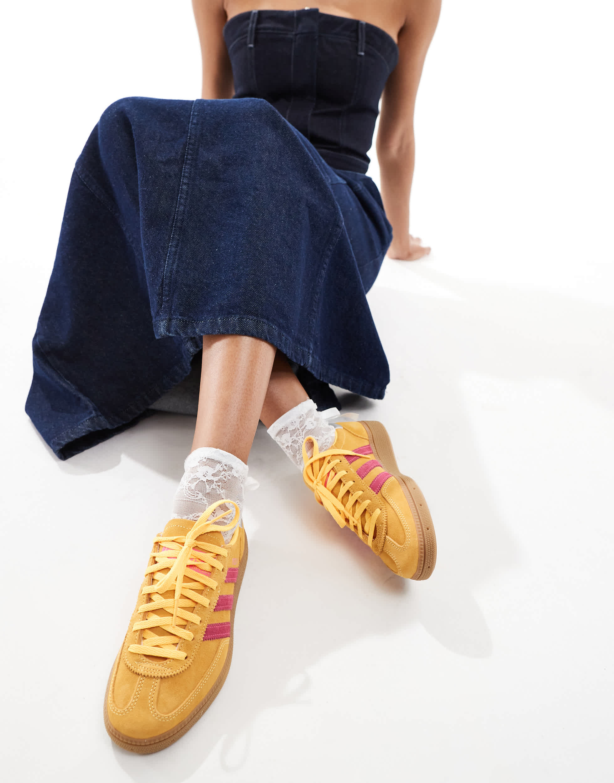 adidas Originals Handball Spezial trainers in yellow and pink with gum sole