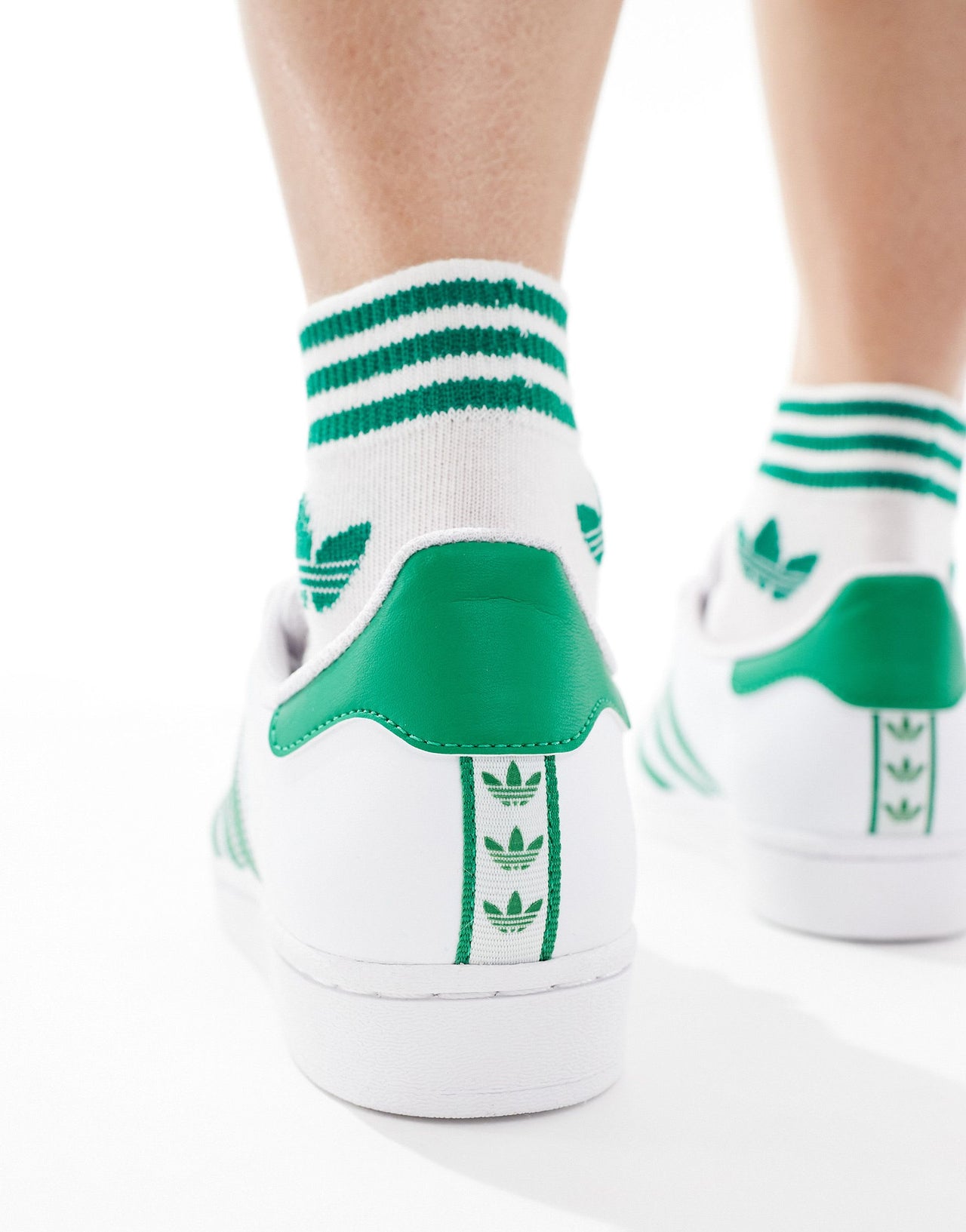 adidas Originals Superstar trainers in white and green