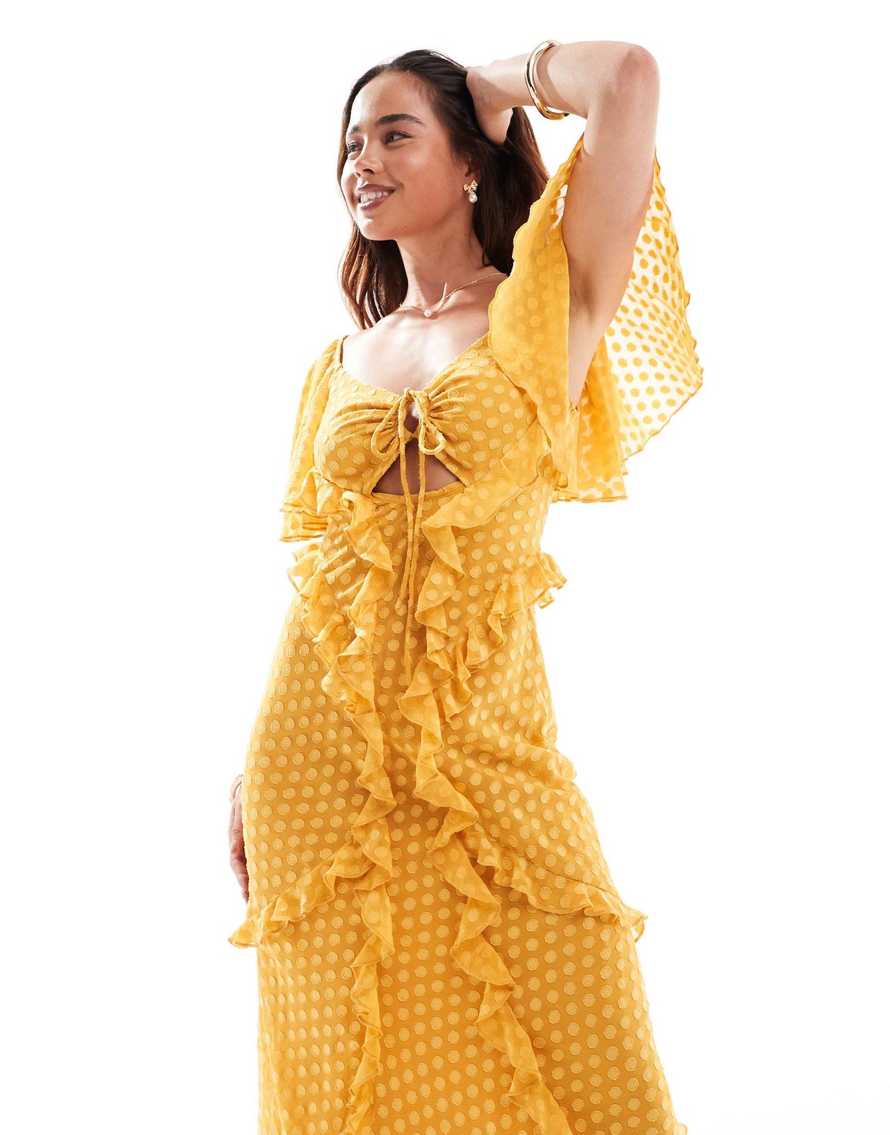 ASOS DESIGN flutter sleeve ruffle maxi dress with cut out detail in textured spot in burnt yellow