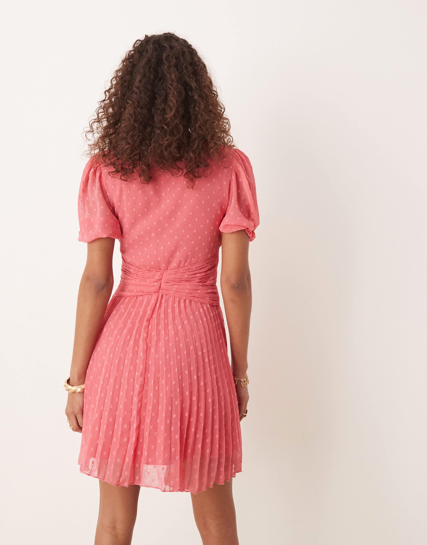 ASOS DESIGN V neck double twist front pleated mini dress  in coral pink