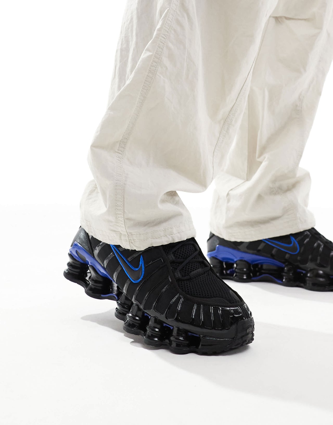 Nike Shox TL trainers in black and racer blue