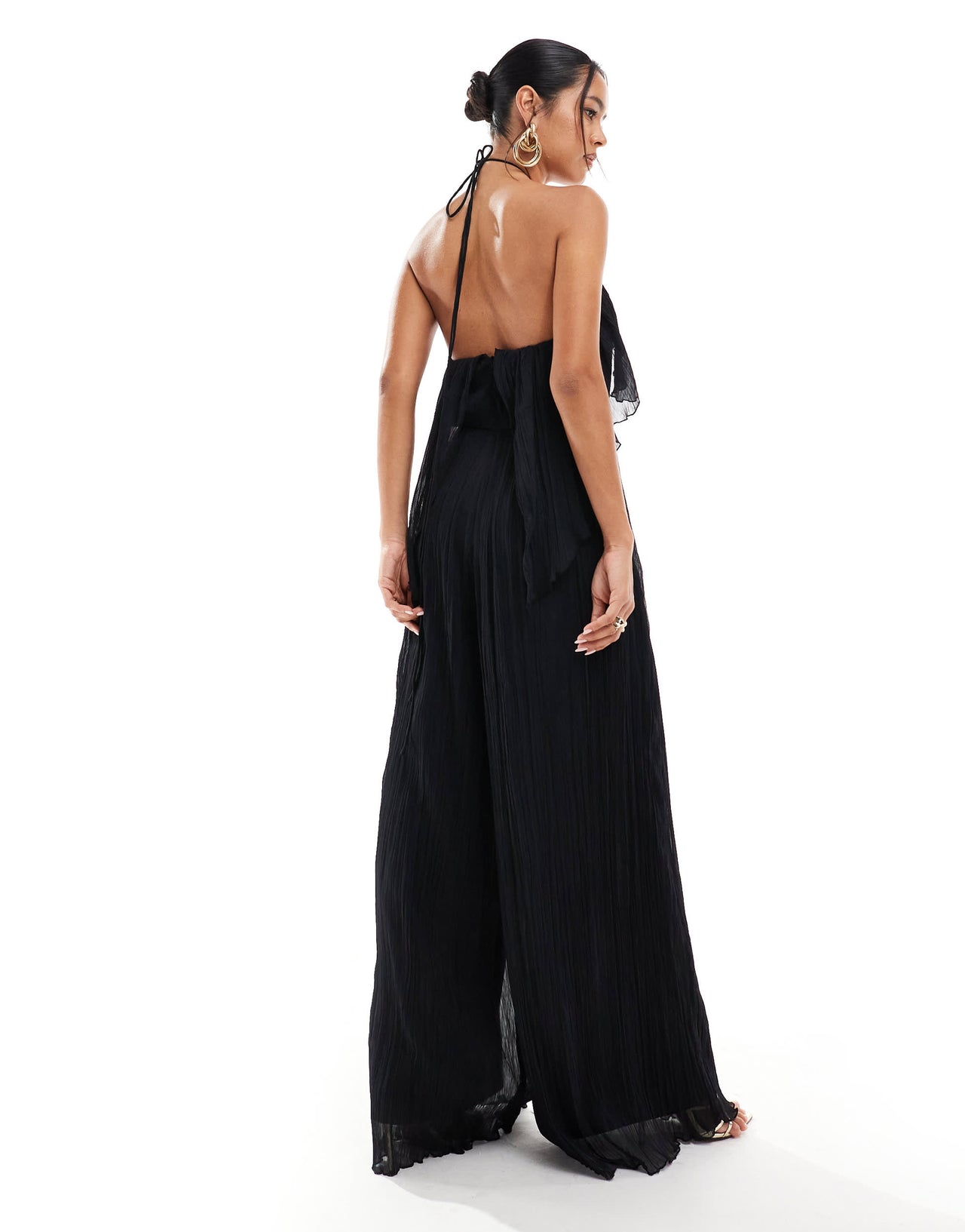 ASOS DESIGN textured halter wide leg jumpsuit with frill detail in black