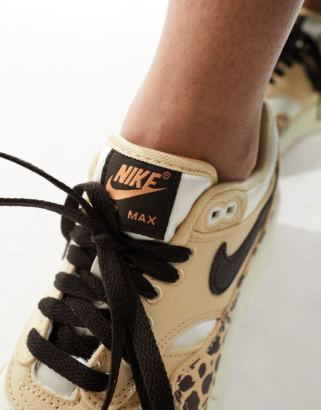Nike Air Max 1 trainers in leopard print