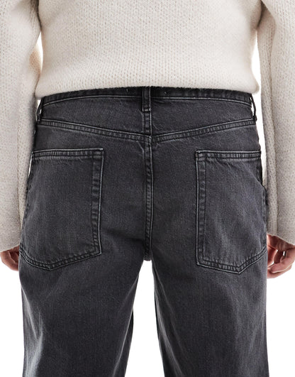 ASOS DESIGN straight leg jeans with rips in washed black