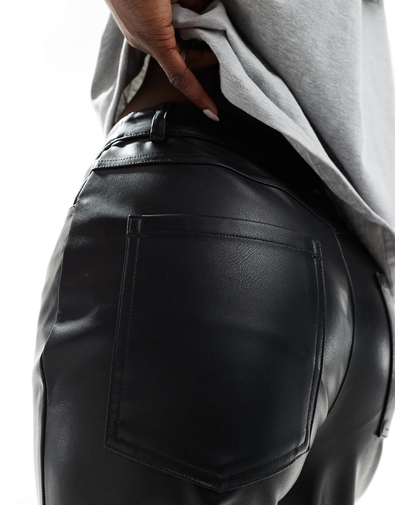 ASOS DESIGN faux leather straight leg trousers in black