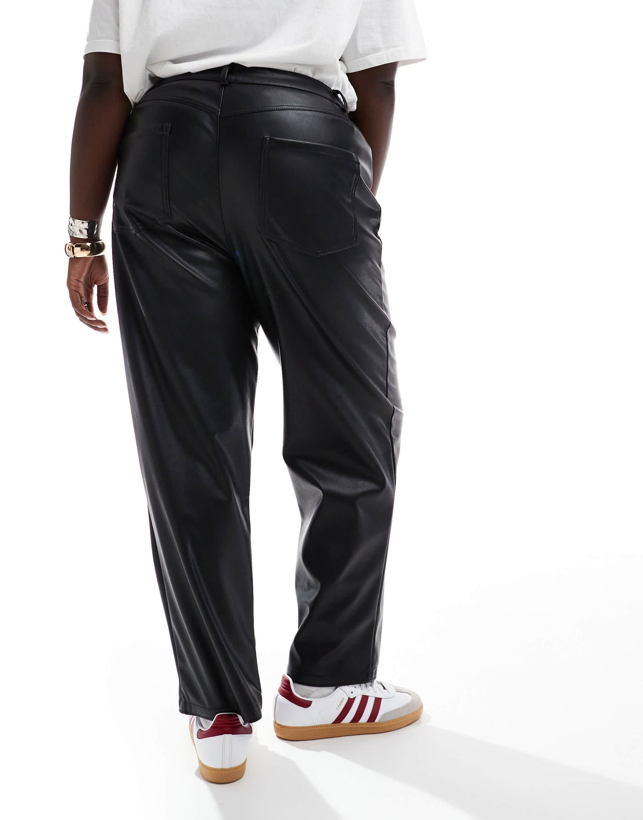 ASOS DESIGN Curve faux leather straight leg trousers in black