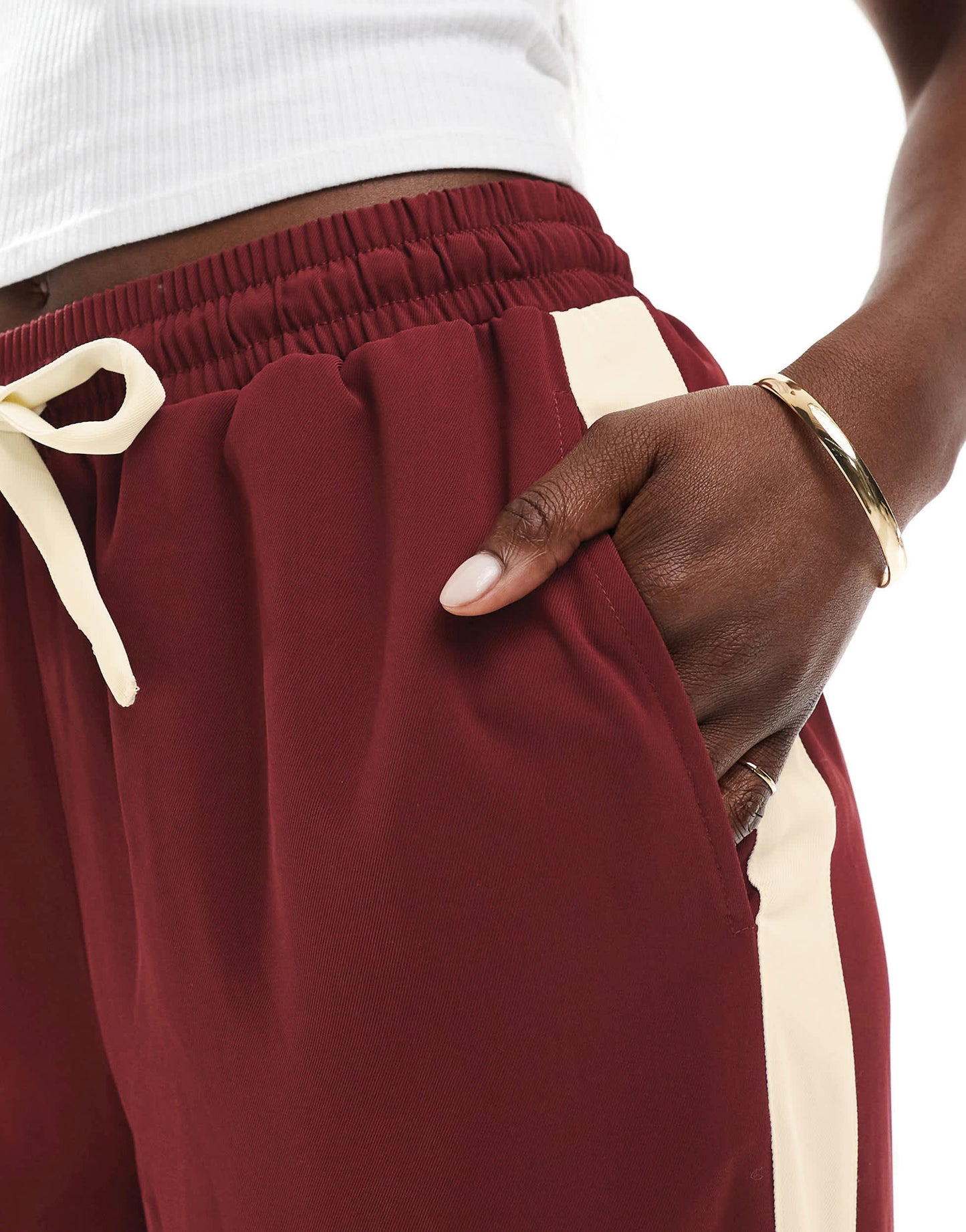 ASOS DESIGN pull on trousers with contrast panel in dark cherry
