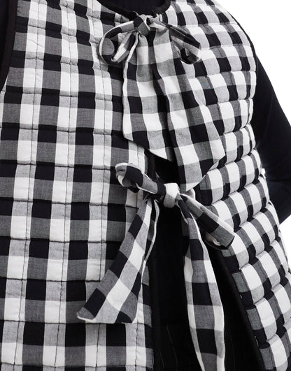 ASOS DESIGN quilted gilet with bows in mono gingham