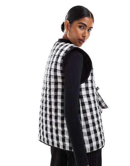 ASOS DESIGN quilted gilet with bows in mono gingham