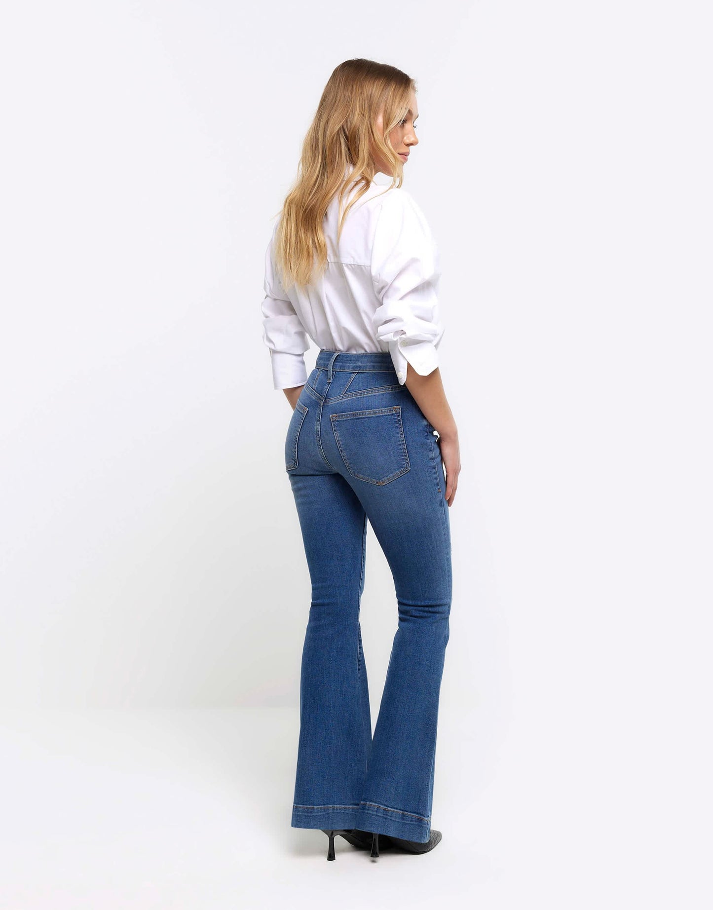 River Island Petite Mid rise flared jeans in denim