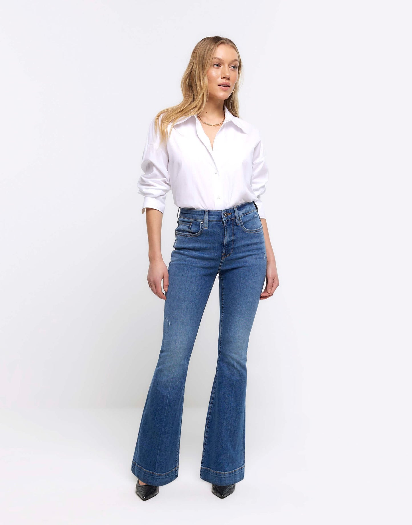 River Island Petite Mid rise flared jeans in denim