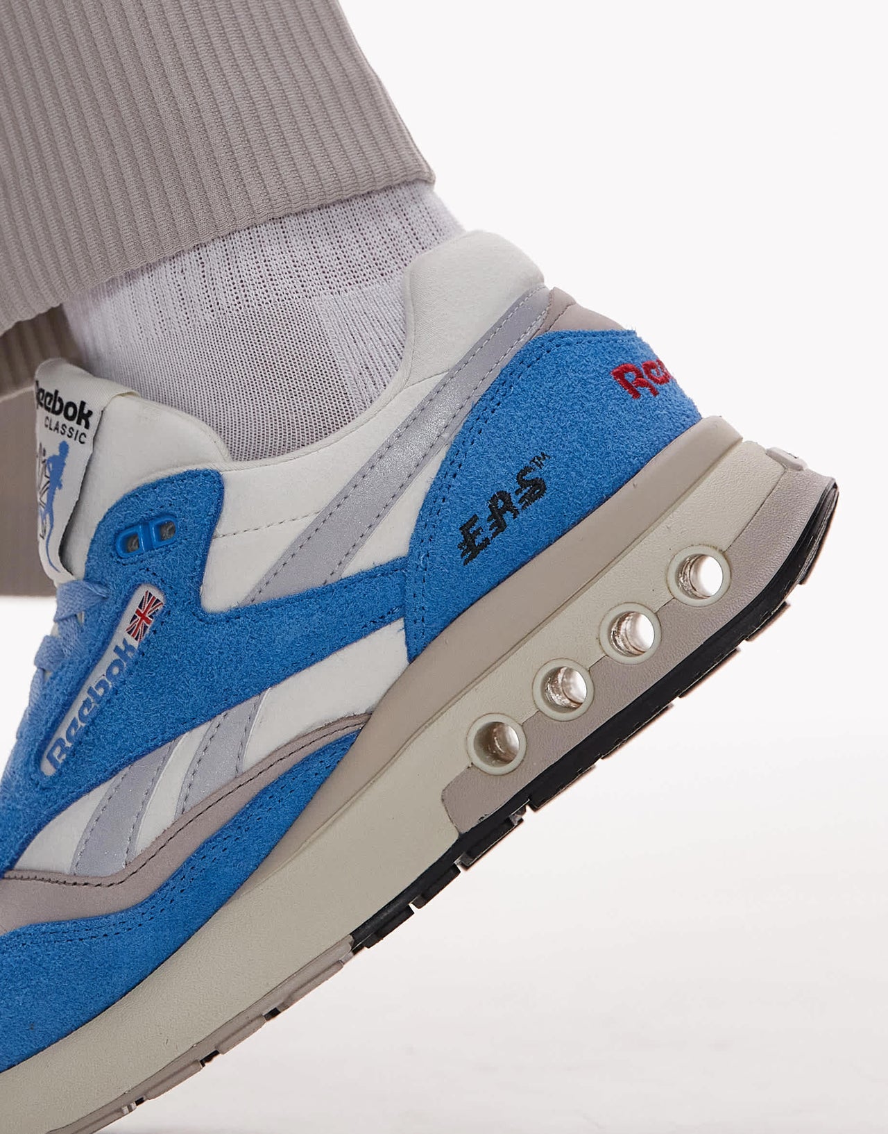 Reebok ERS World trainers in blue and white