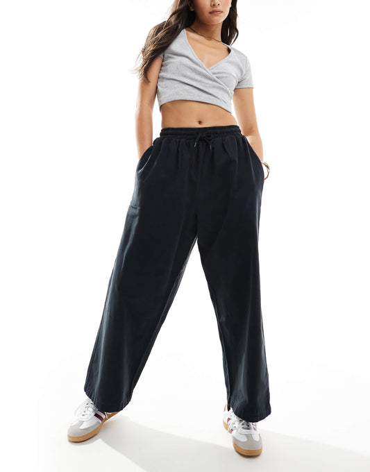 ASOS DESIGN oversized barrel leg pull on trousers in black