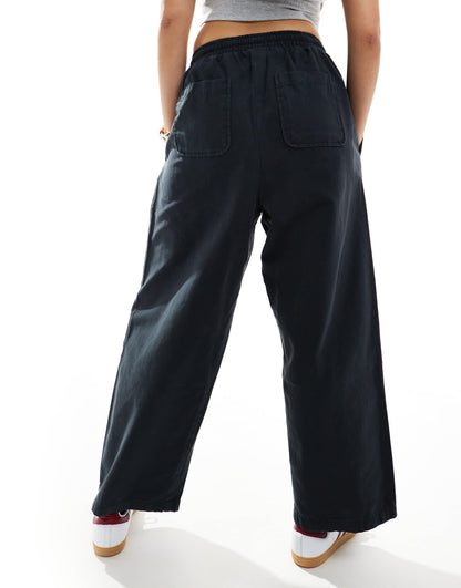 ASOS DESIGN oversized barrel leg pull on trousers in black