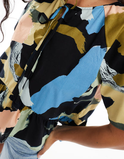 ASOS DESIGN smock tie front top in arty abstract print