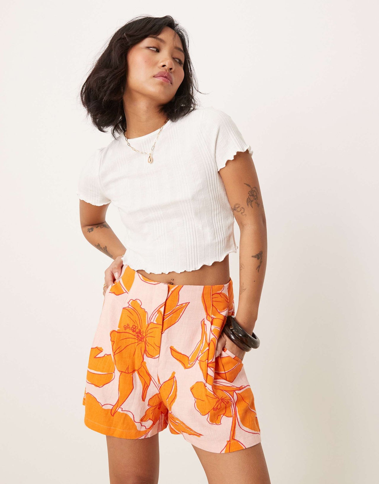 ASOS DESIGN Petite high waist seam detail tailored shorts with linen in palm print