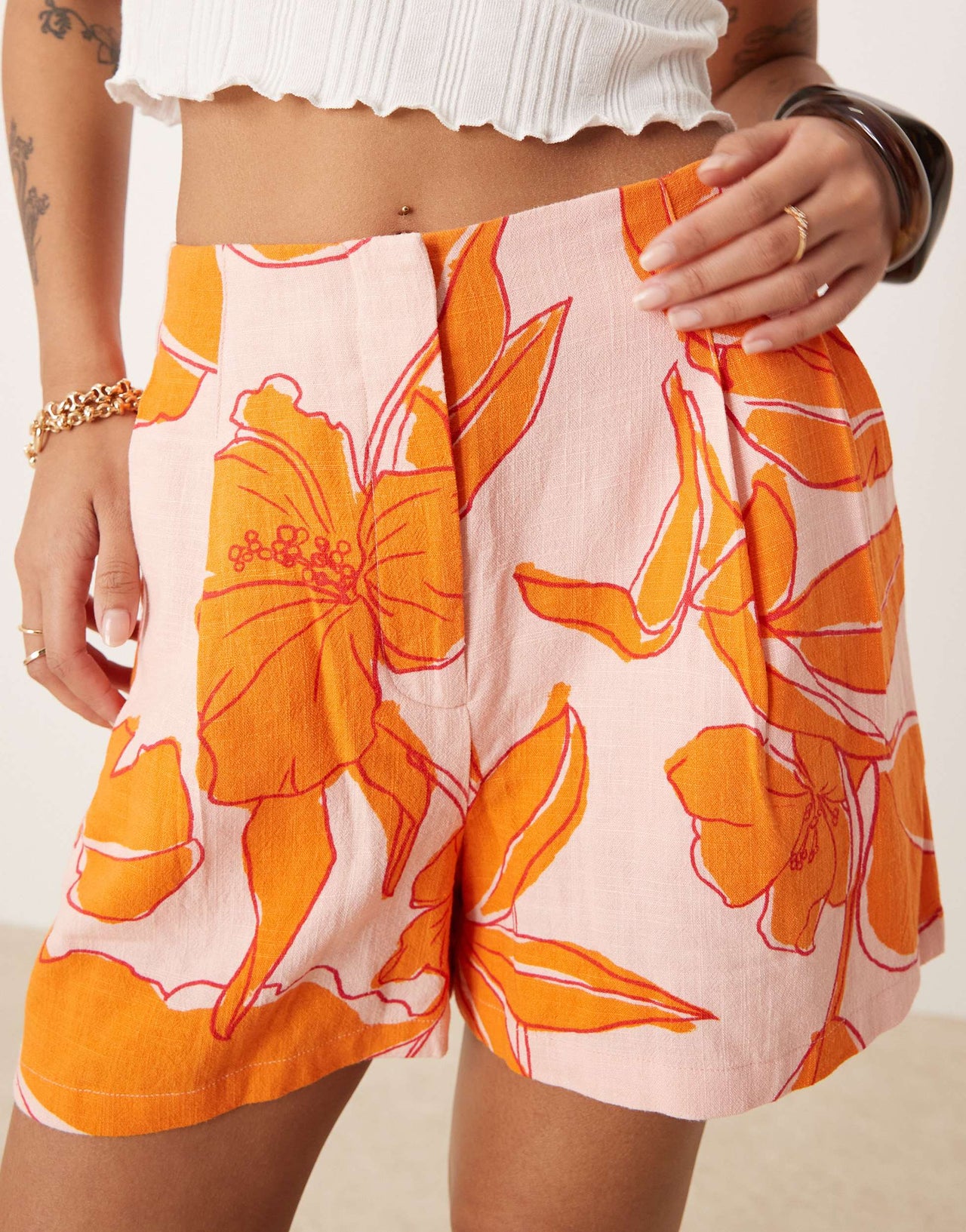 ASOS DESIGN Petite high waist seam detail tailored shorts with linen in palm print