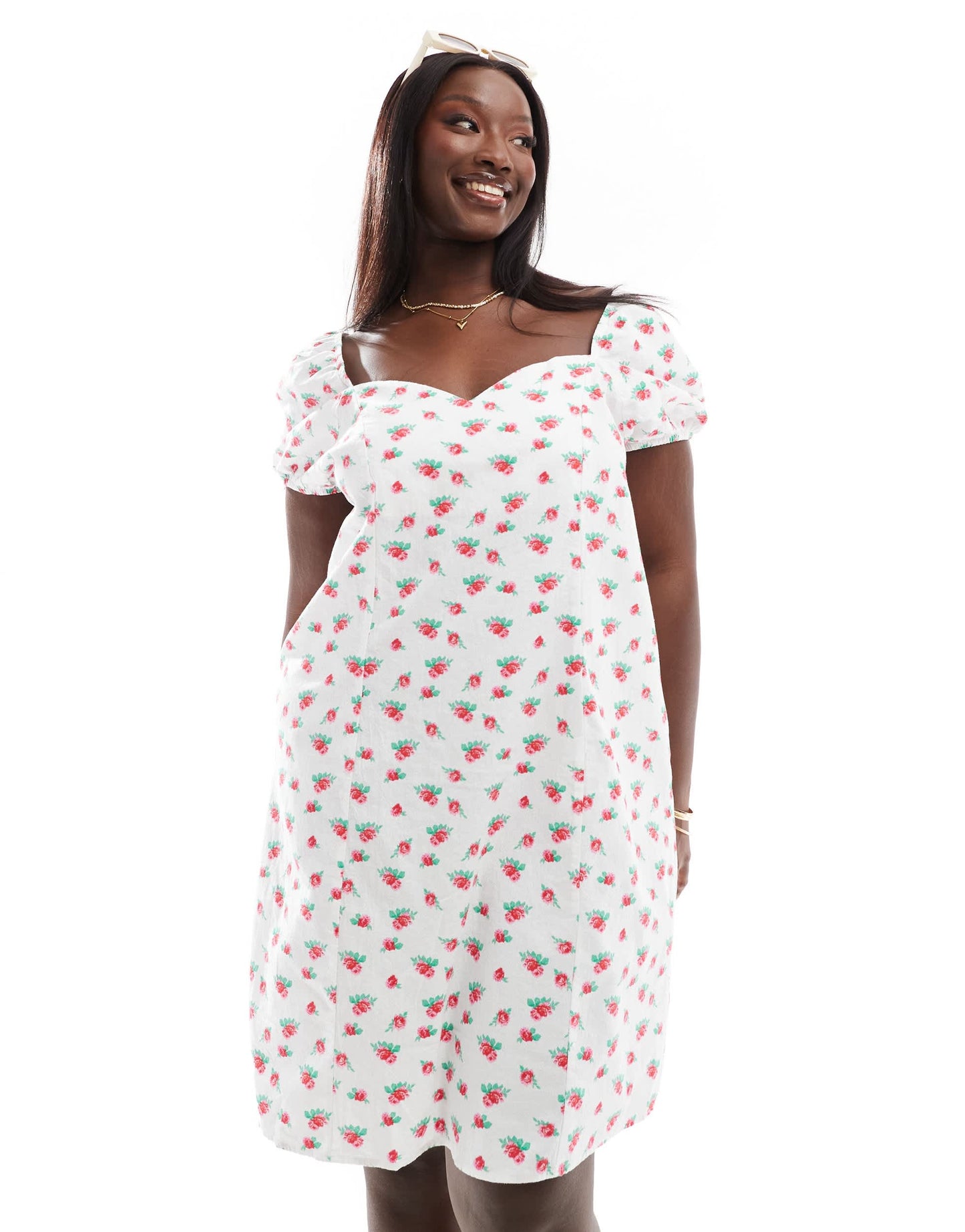 Vero Moda Curve sweetheart neck mini dress with puff sleeves in floral print