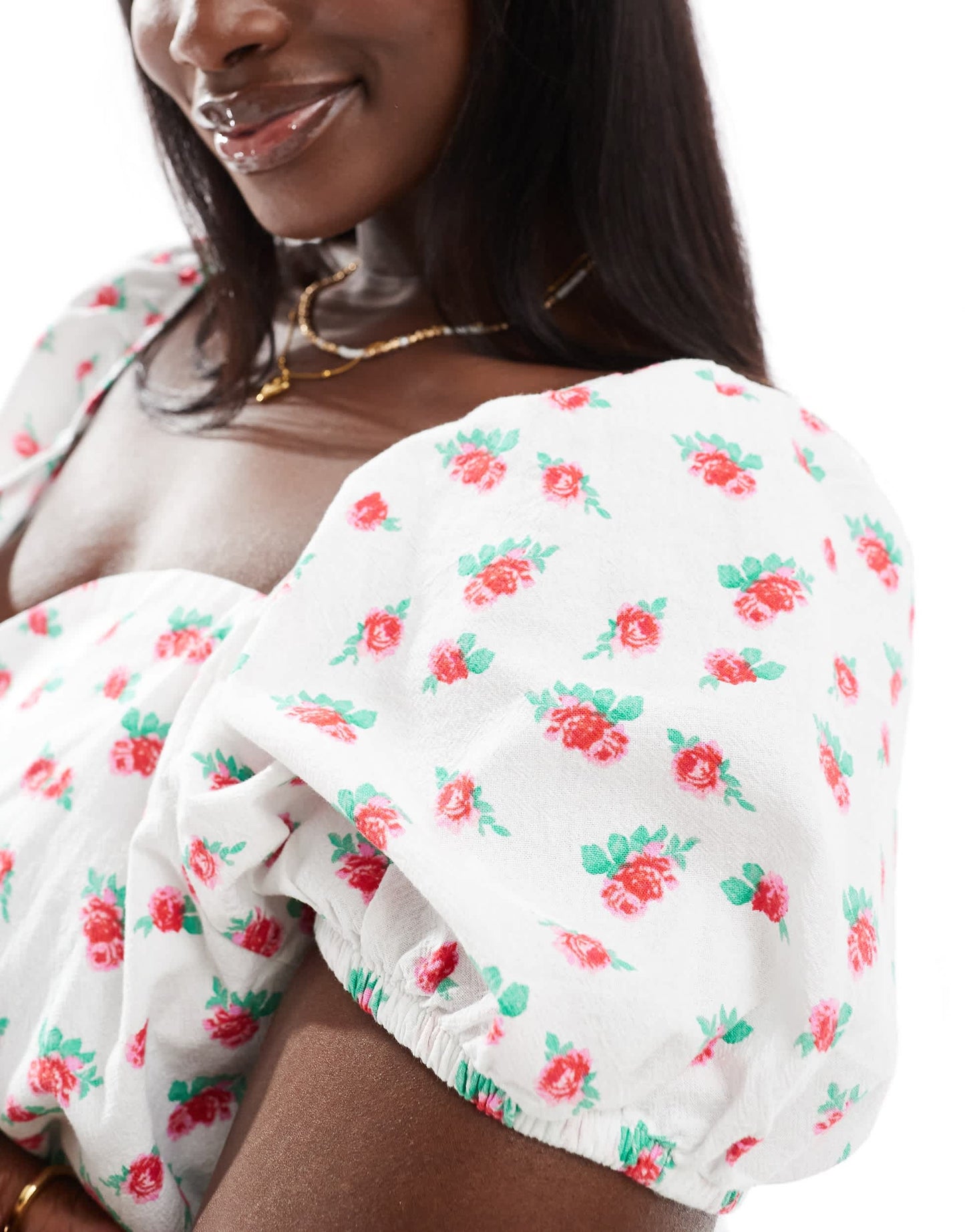 Vero Moda Curve sweetheart neck mini dress with puff sleeves in floral print