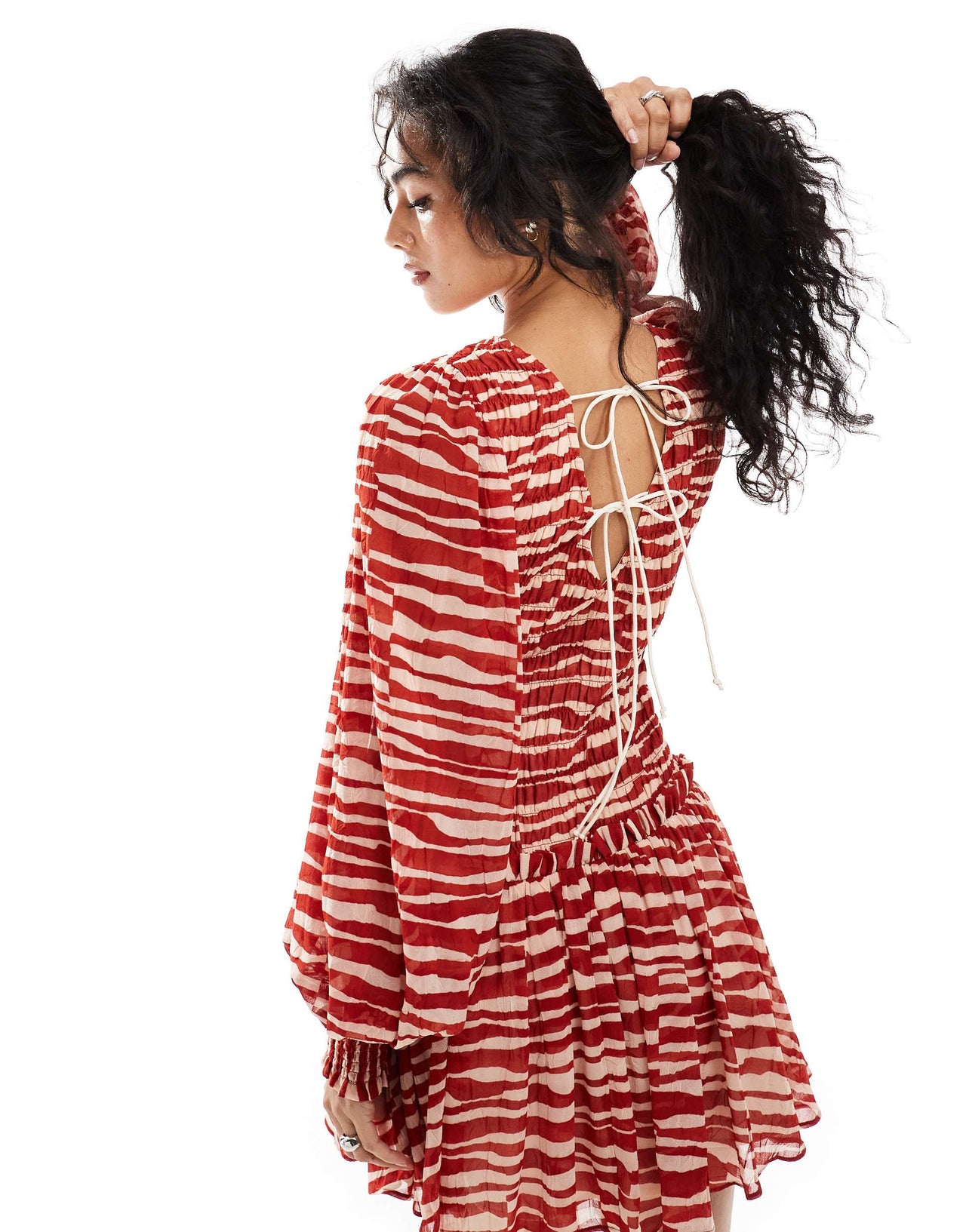 ASOS DESIGN shirred bodice tie up back mini dress in red abstract print