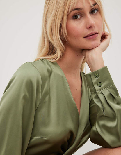 NA-KD twist front satin mini dress in green