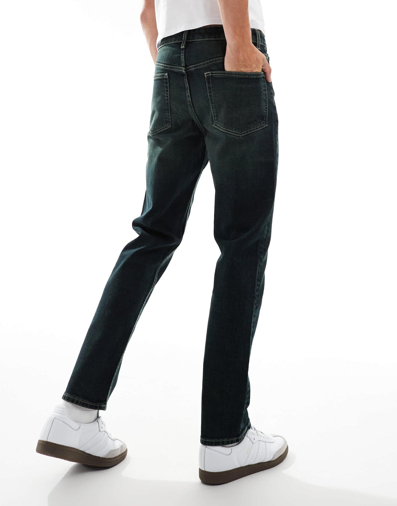 ASOS DESIGN slim jeans in washed black with green tint