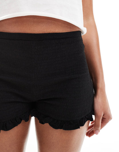 COLLUSION micro textured short in black