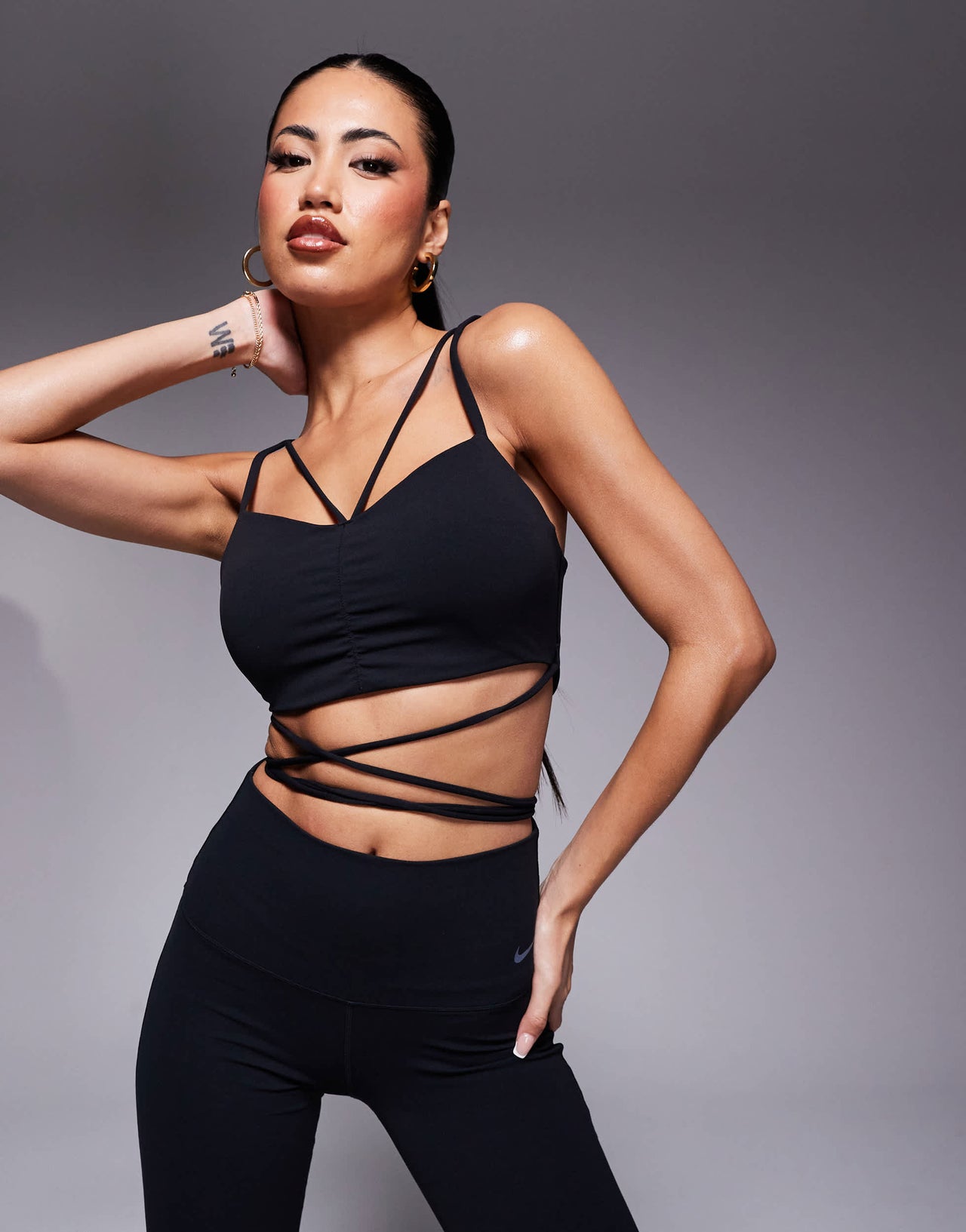 Nike Training Zenvy Yoga strappy wrap light support sports bra in black