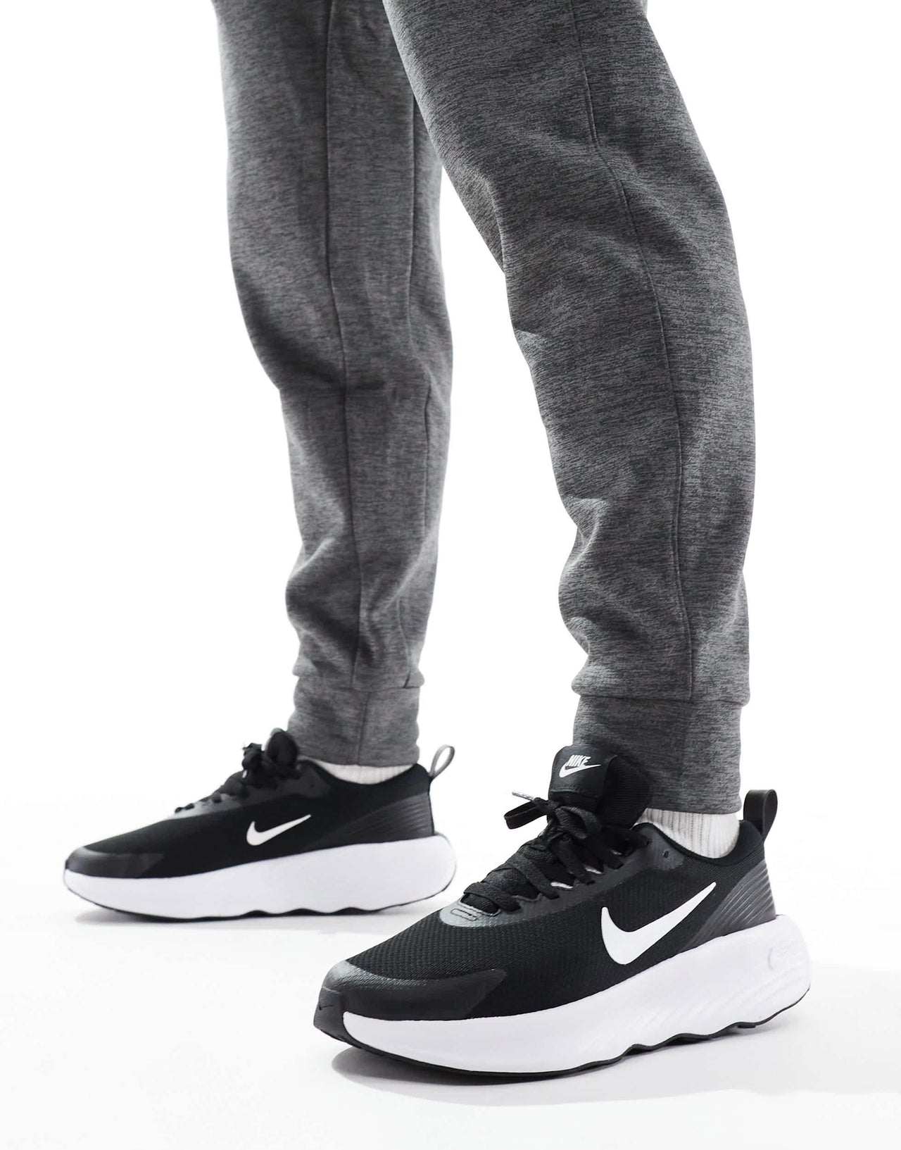 Nike Training Legend Essential 4 trainers in black and white