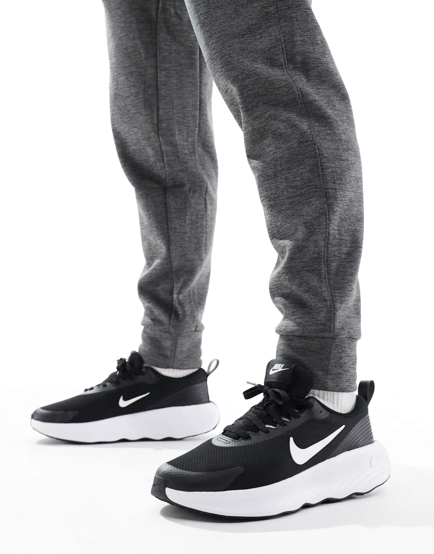 Nike Training Legend Essential 4 trainers in black and white
