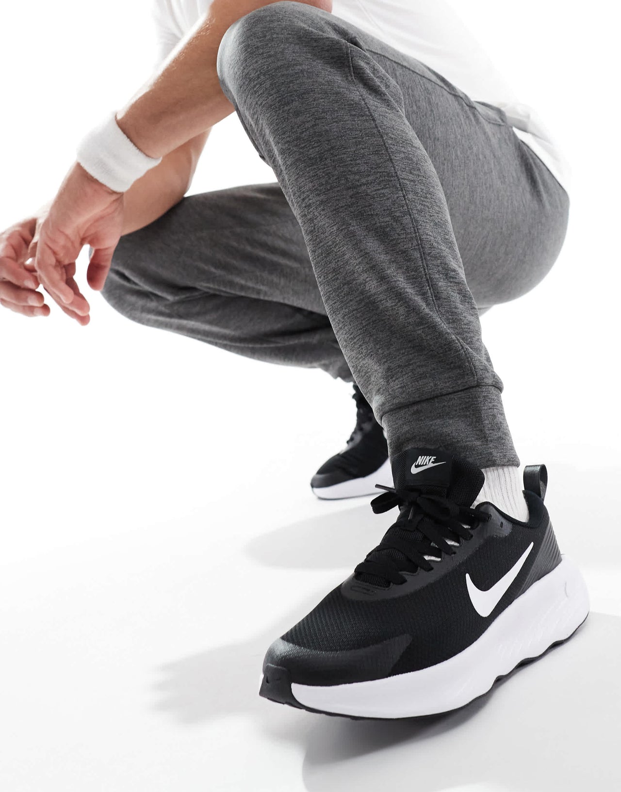 Nike Training Legend Essential 4 trainers in black and white
