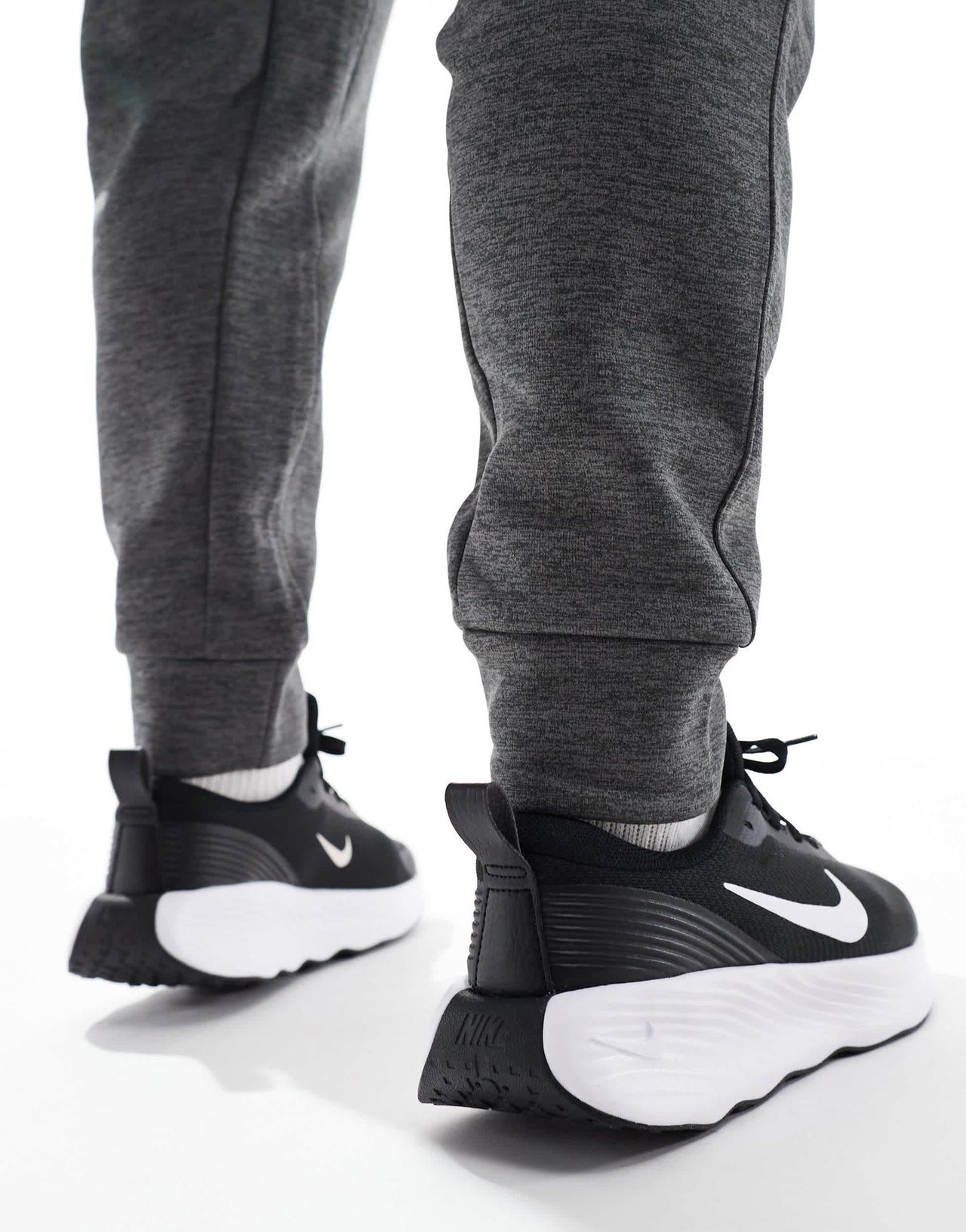 Nike Training Legend Essential 4 trainers in black and white