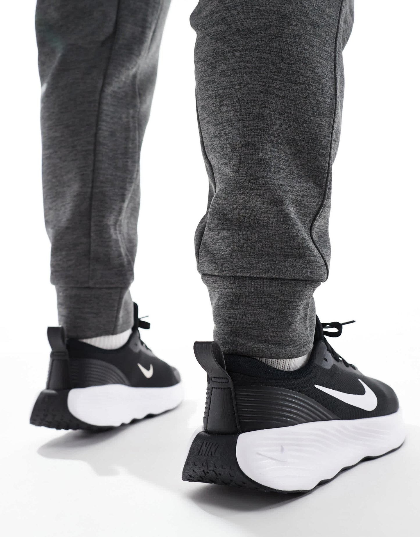 Nike Training Legend Essential 4 trainers in black and white