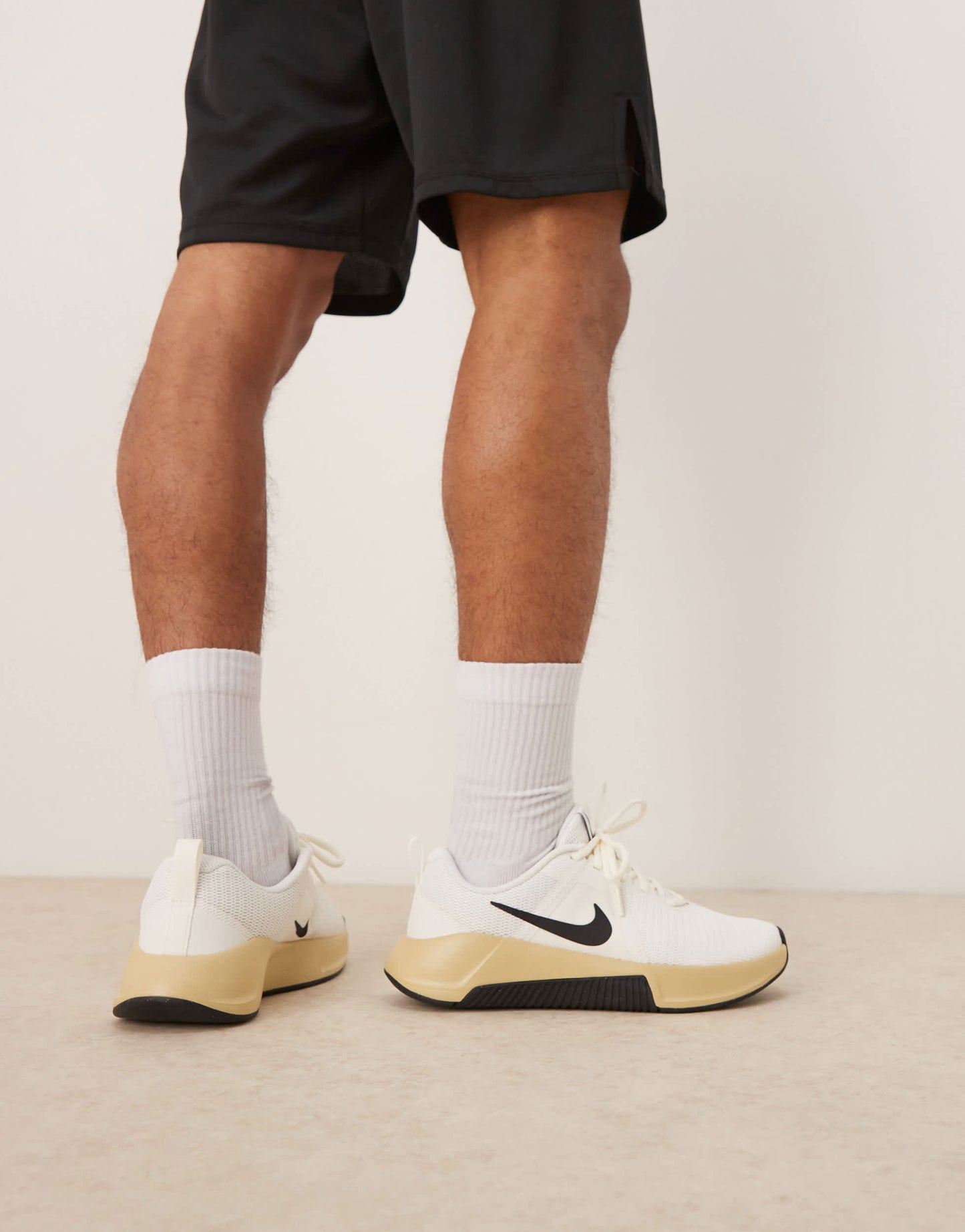 Nike Training MC Trainer 3 trainers in off white and black