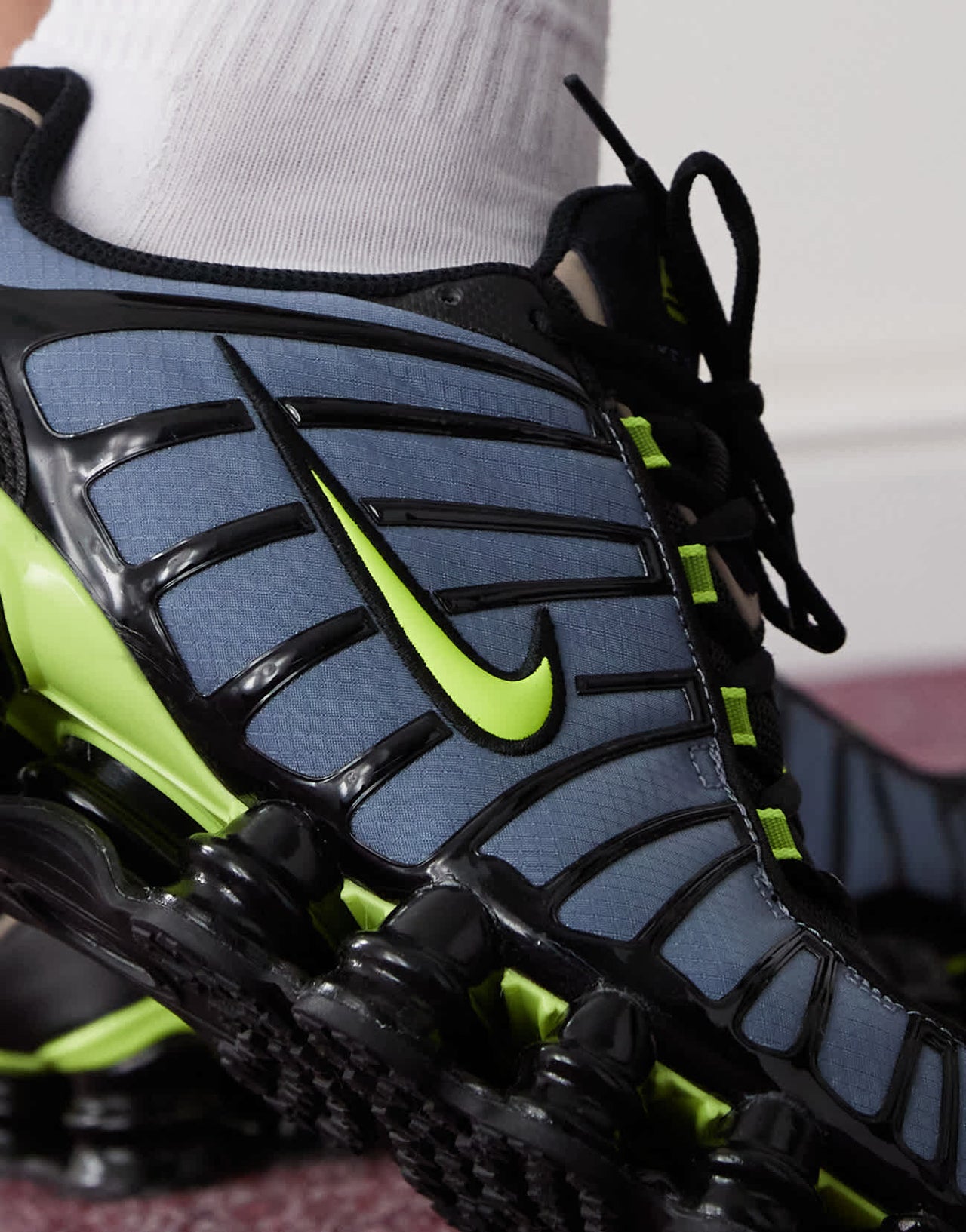 Nike Shox TL trainers in blue and green