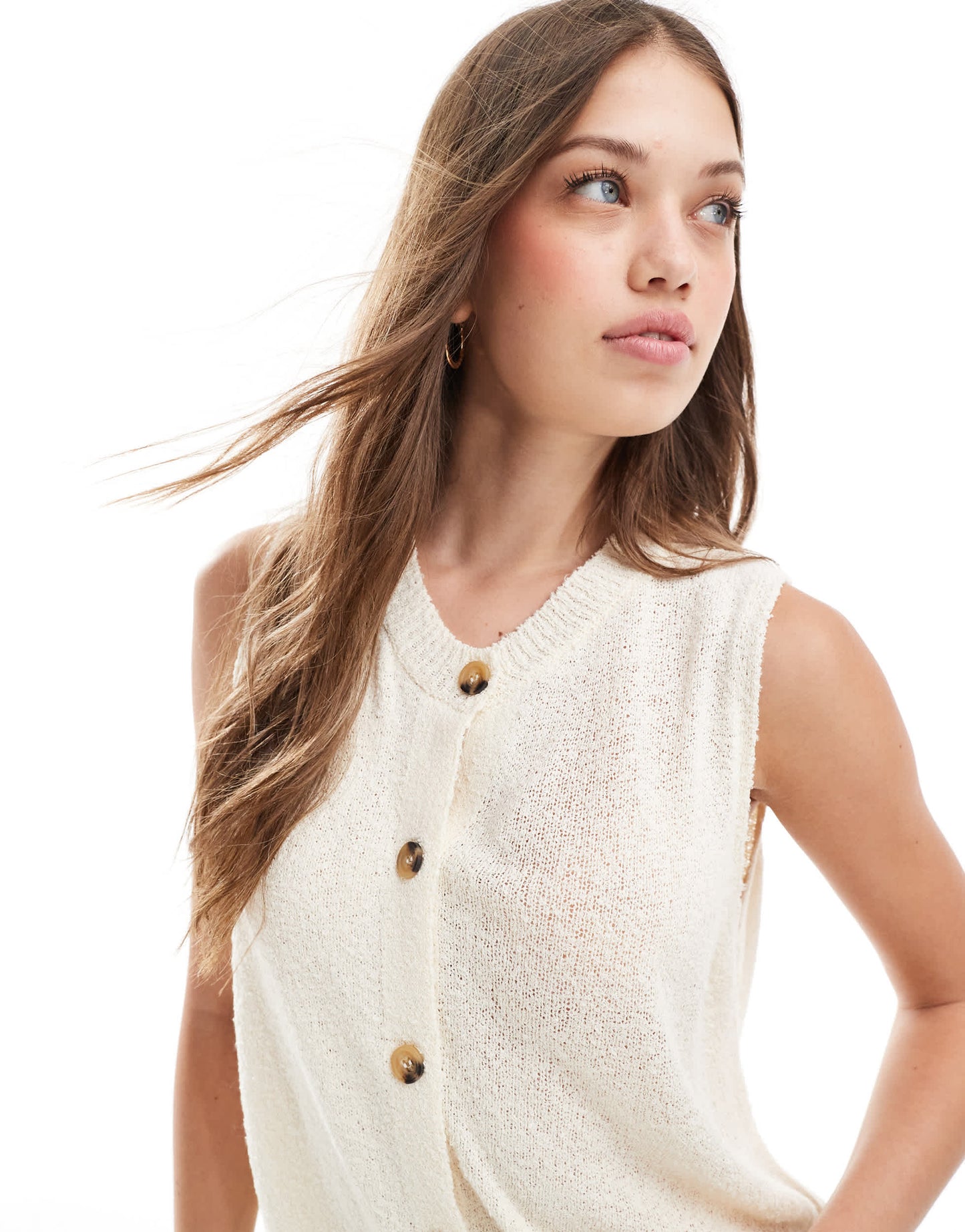 ASOS DESIGN knitted crew neck waistcoat in textured yarn in cream