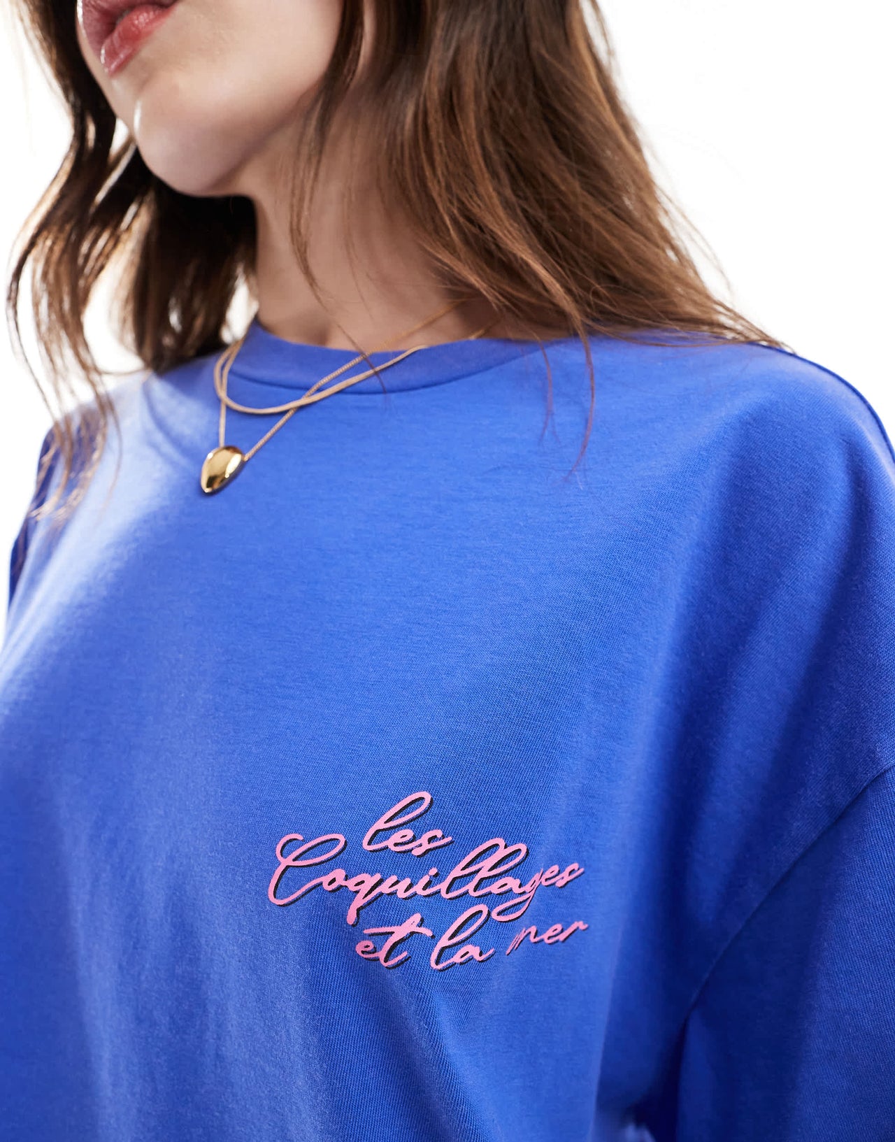 ASOS DESIGN boyfriend fit t-shirt with bonjour la mer shell graphic in blue