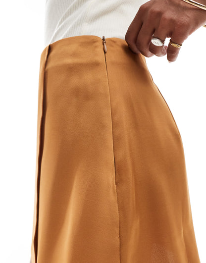 ASOS DESIGN Petite wrap satin skirt in gold