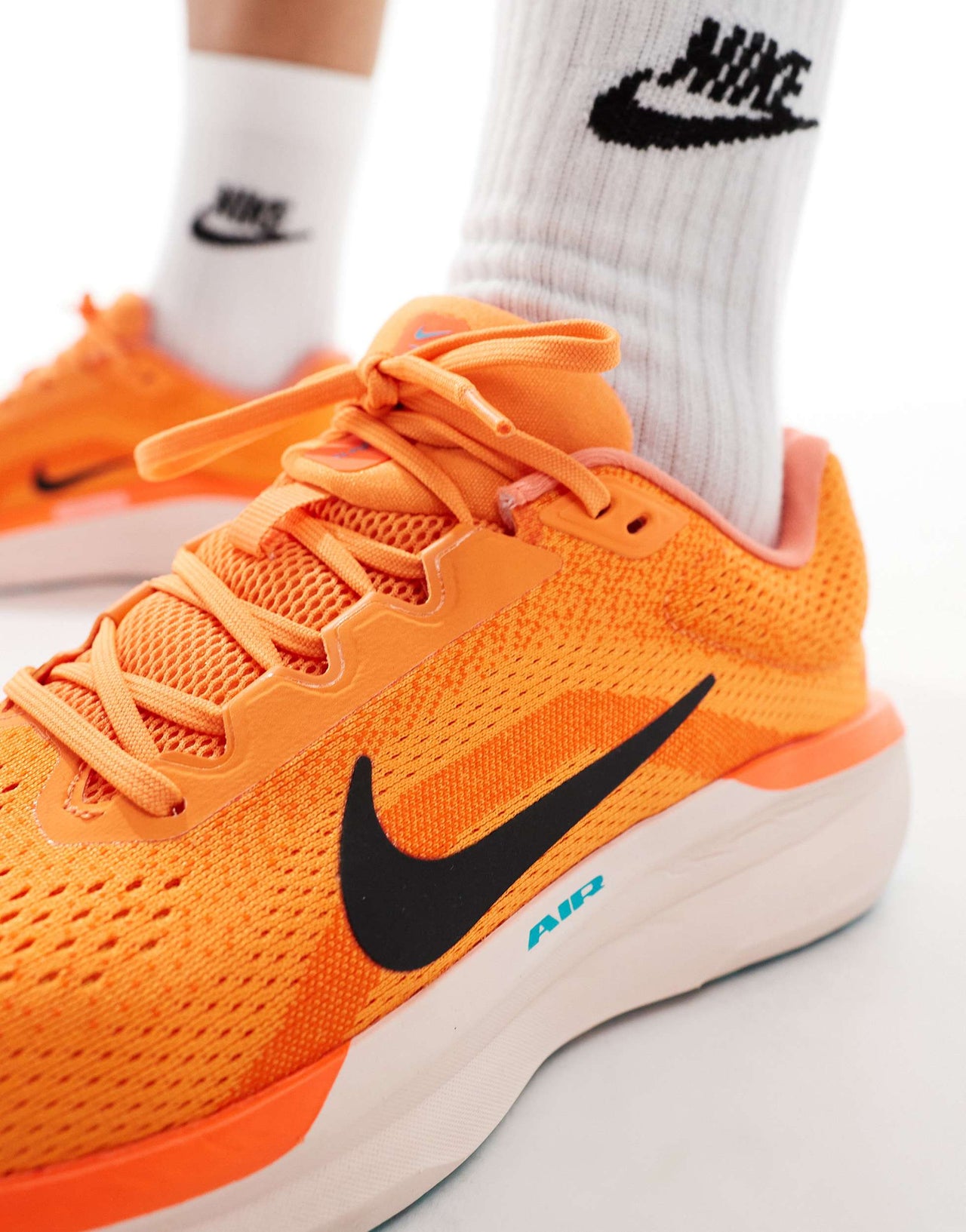 Nike Running Air Winflo 11 trainers in orange