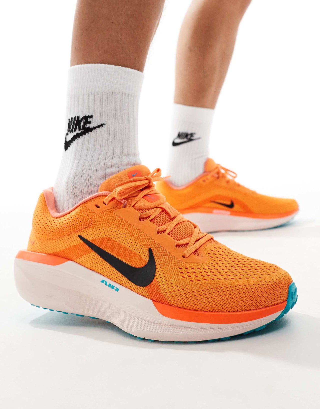 Nike Running Air Winflo 11 trainers in orange