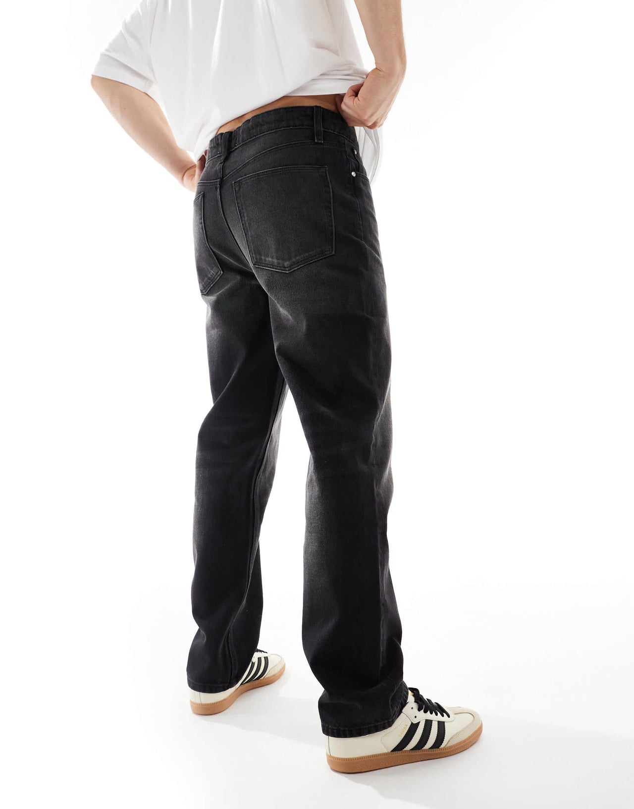 ASOS DESIGN straight leg jeans in washed black with light tint