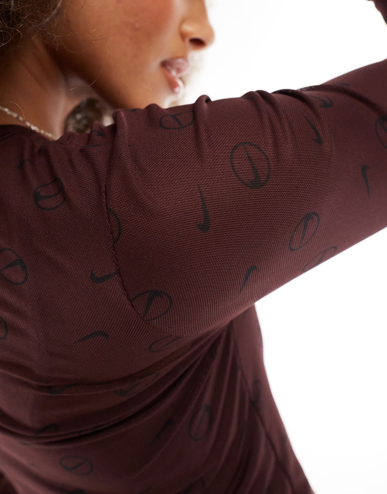 Nike Streetwear sheer logo longsleeve top in burgundy