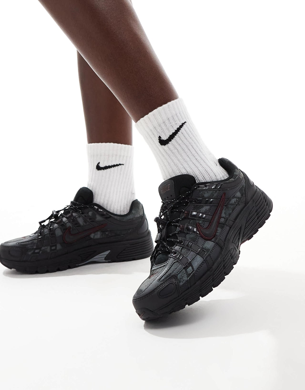 Nike P-6000 trainers in black and burgundy