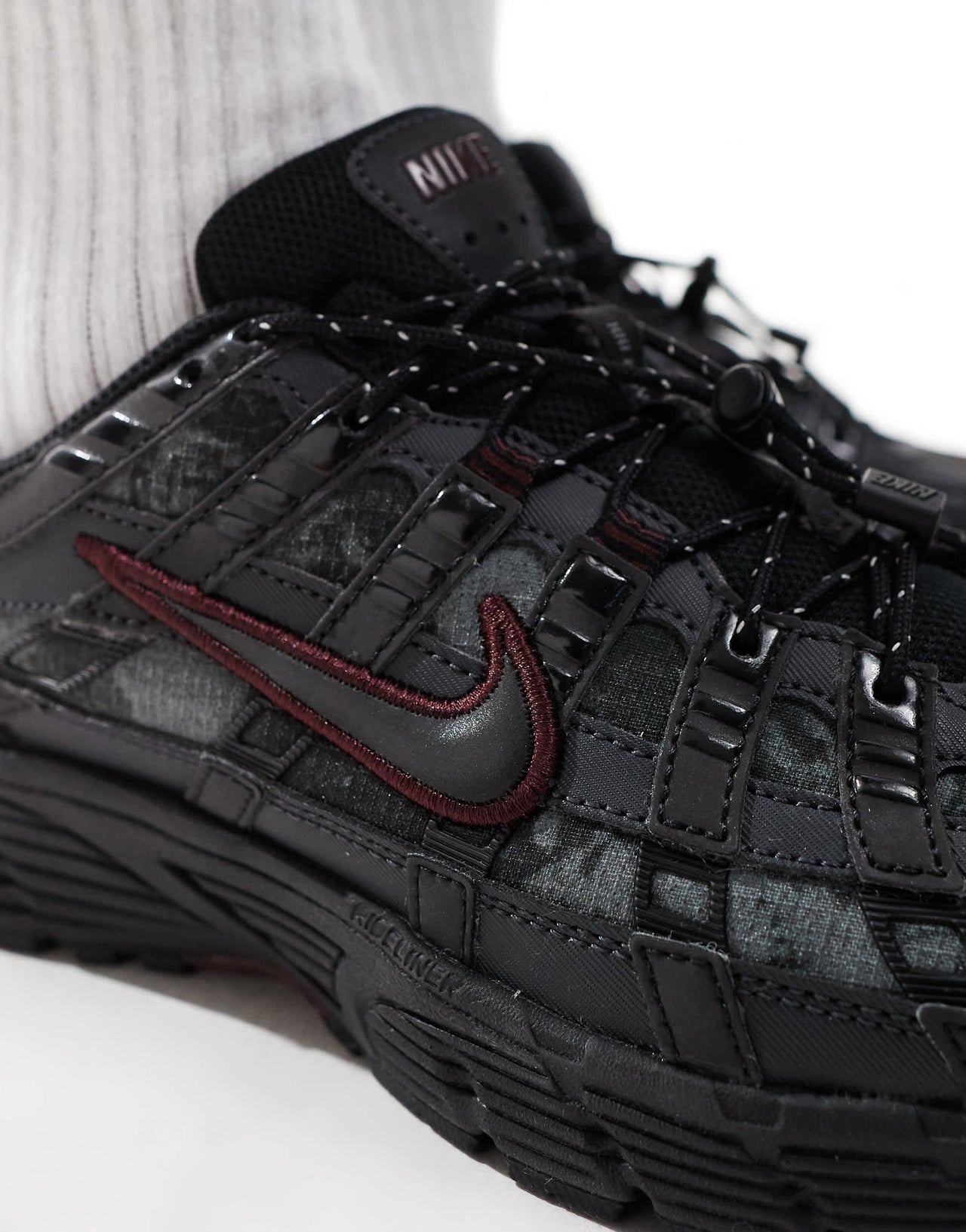 Nike P-6000 trainers in black and burgundy
