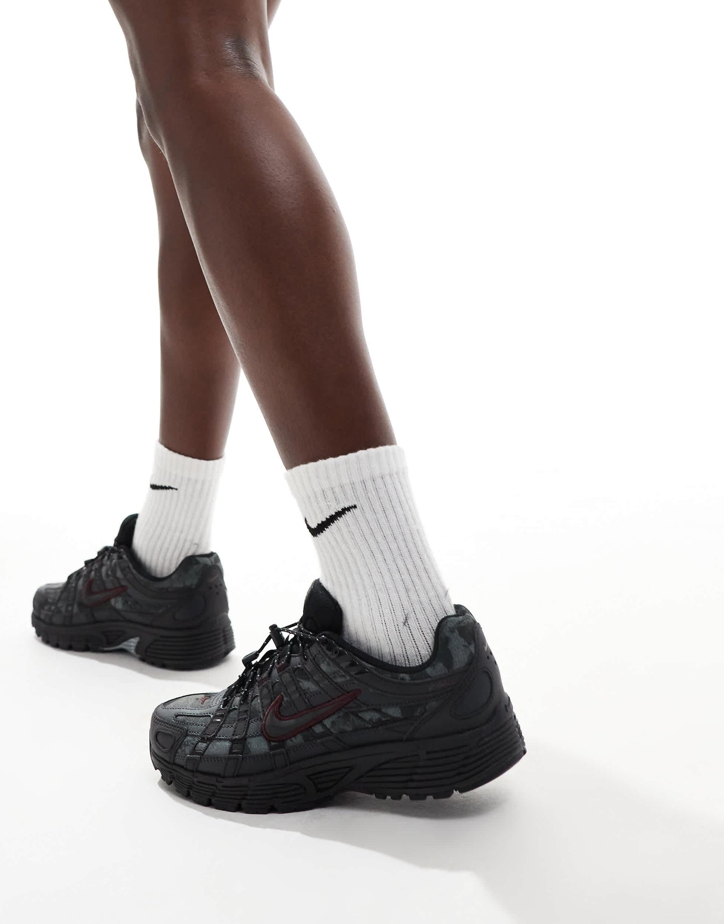 Nike P-6000 trainers in black and burgundy