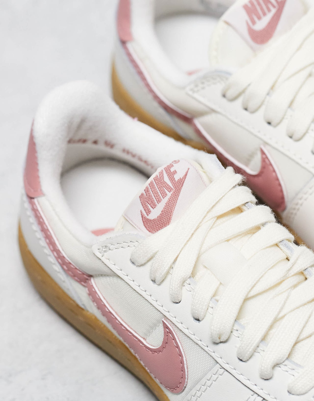 Nike Field General trainers in white and pink