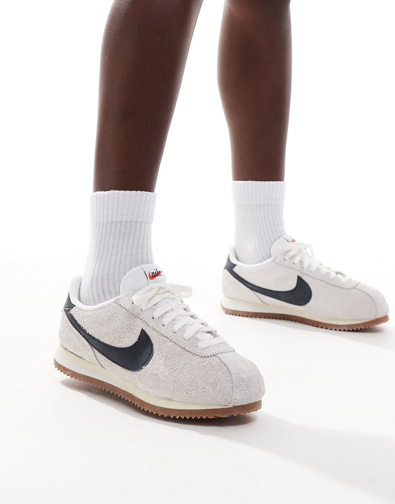 Nike Cortez suede trainers in white and black
