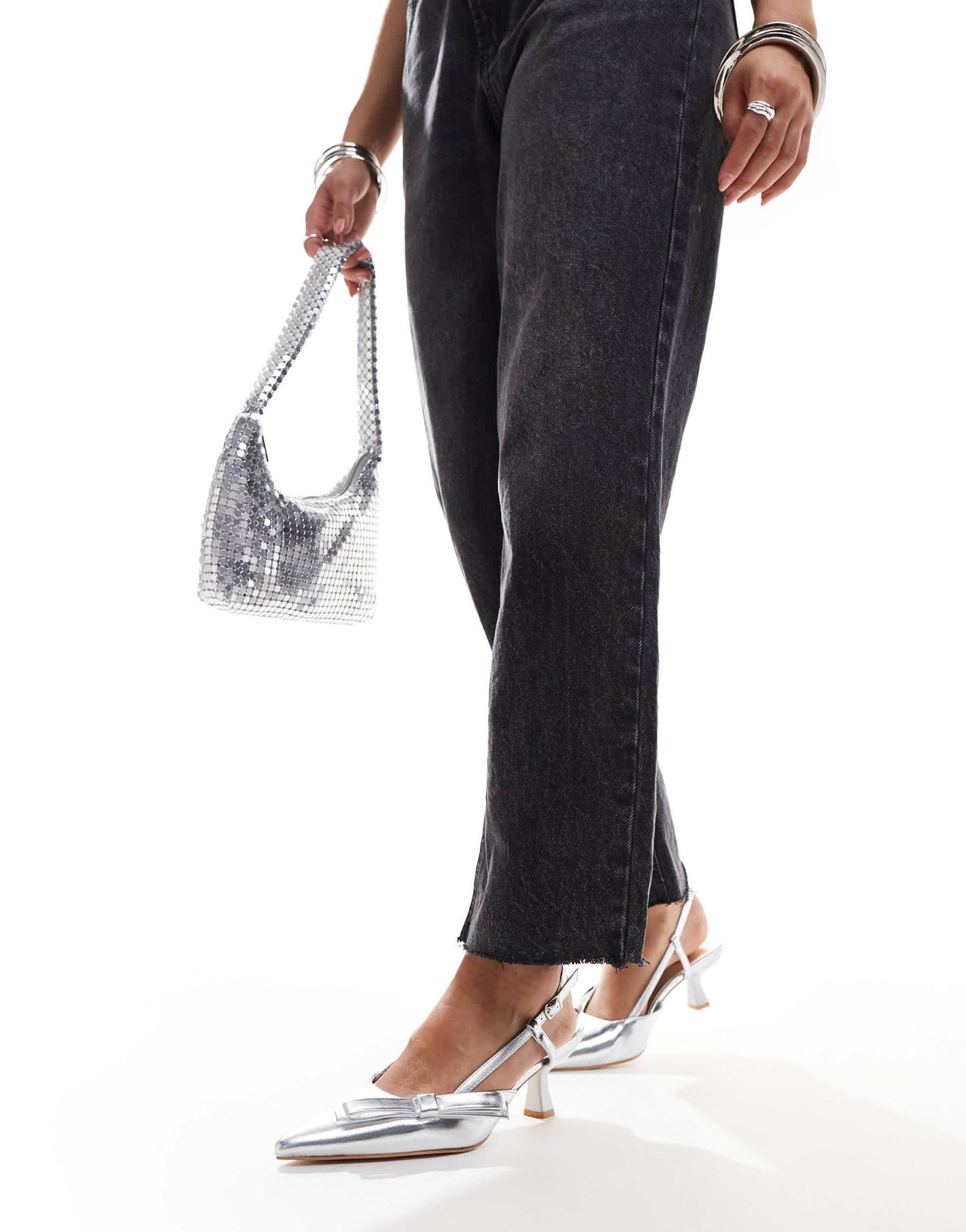 Glamorous slingback kitten heeled shoes with bow in silver