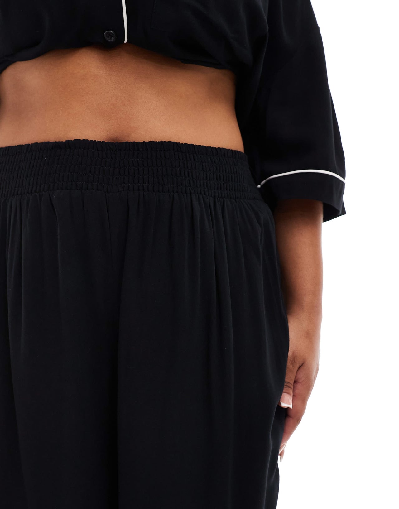 ASOS DESIGN Curve super soft slinky wide leg pyjama trouser in black with contrast binding